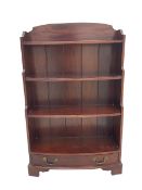 Mahogany bow fronted water fall bookcase fitted with drawer