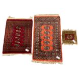 Two small Persian Bokhara rugs (largest - 106cm x 64cm)