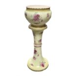 An early 20th century ceramic jardiniere on stand