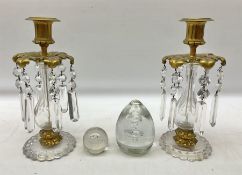 Pair of candlesticks with brass mounts and faceted drops