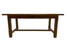 Light oak rectangular dining table with two additional leaves