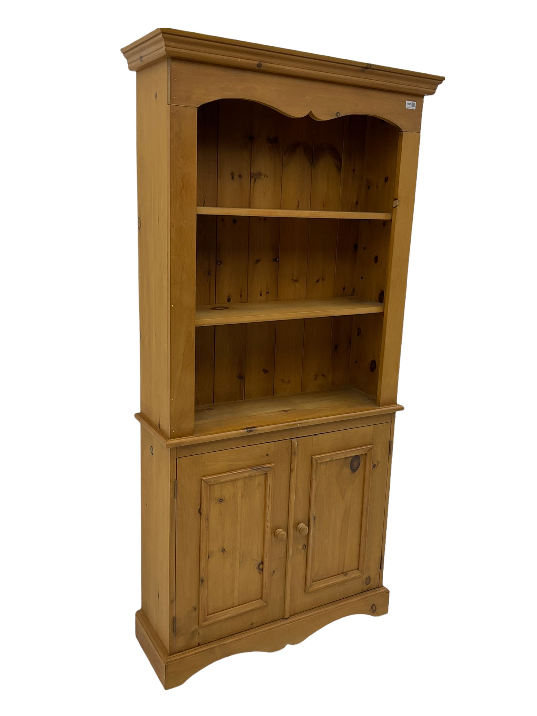 Solid pine open bookcase with two cupboards