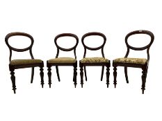 Set of four Victorian mahogany balloon back dining chairs