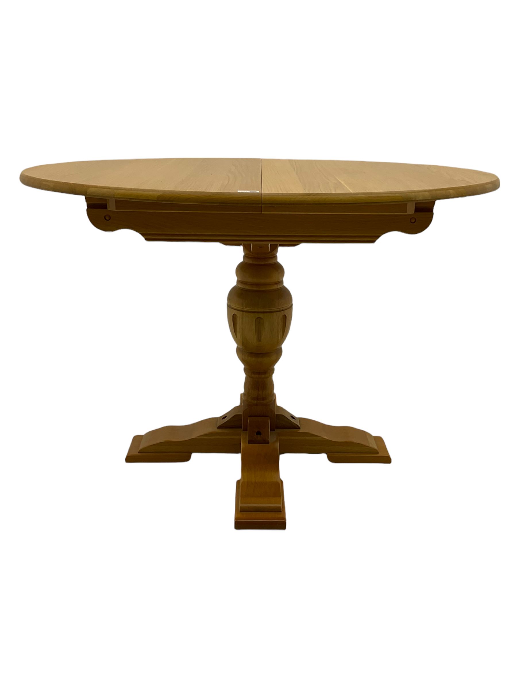 Light oak oval extending dining table - Image 2 of 5
