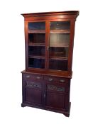 Late Victorian mahogany glazed bookcase on cupboard