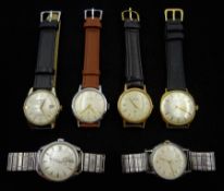 Six plated and stainless steel manual wind wristwatches including Baume