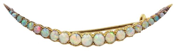 Early 20th century 18ct gold graduating opal crescent brooch