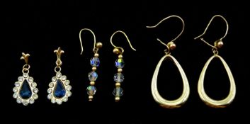 Pair of gold pear shaped hoop pendant earrings
