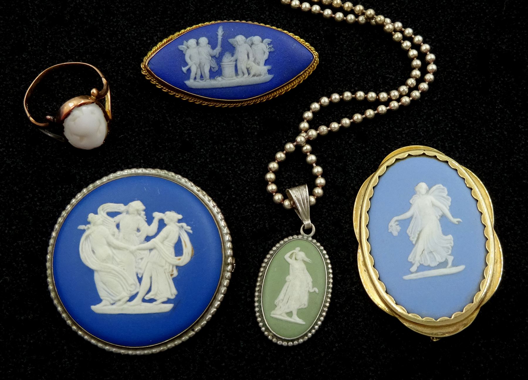 Wedgewood Jasperware jewellery including two 9ct gold brooches