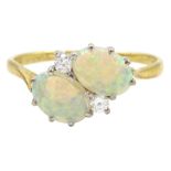 18ct gold two stone oval opal and two stone round brilliant cut diamond crossover ring