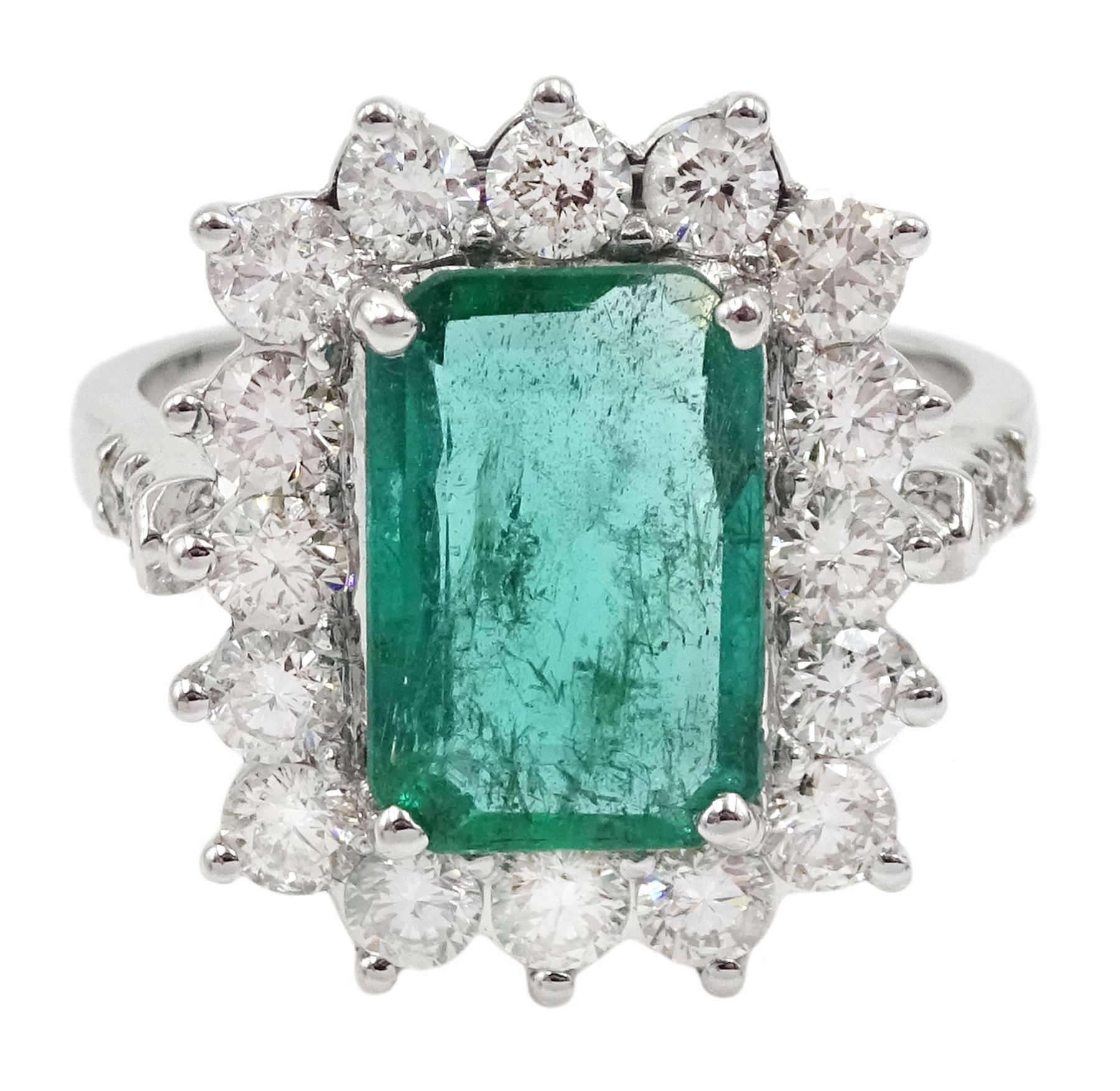 18ct white gold emerald and round brilliant cut diamond cluster ring