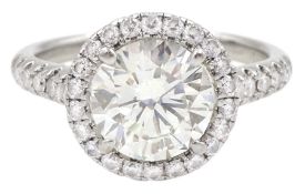 Platinum round brilliant cut diamond halo ring