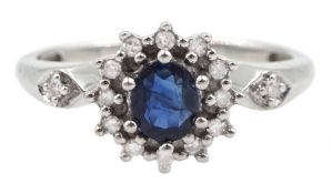 9ct white gold oval sapphire and round brilliant cut diamond cluster ring
