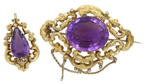 Victorian gold oval amethyst openwork brooch and a similar pear shaped pendant