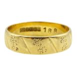 18ct gold wedding band with floral engraving