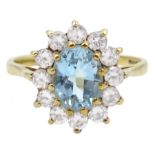 9ct gold oval blue topaz and cubic zirconia cluster ring