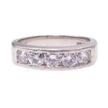 Platinum channel set five stone round brilliant cut diamond ring