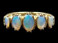 9ct gold five stone graduating opal ring