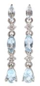 Pair of 9ct white gold pear and marquise shaped blue topaz and diamond pendant stud earrings