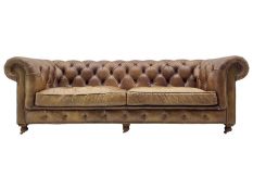 HALO - Chesterfield style four seat sofa upholstered in buttoned brown leather with stud work