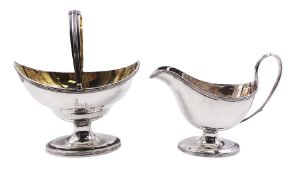 George III silver sugar basket and cream jug