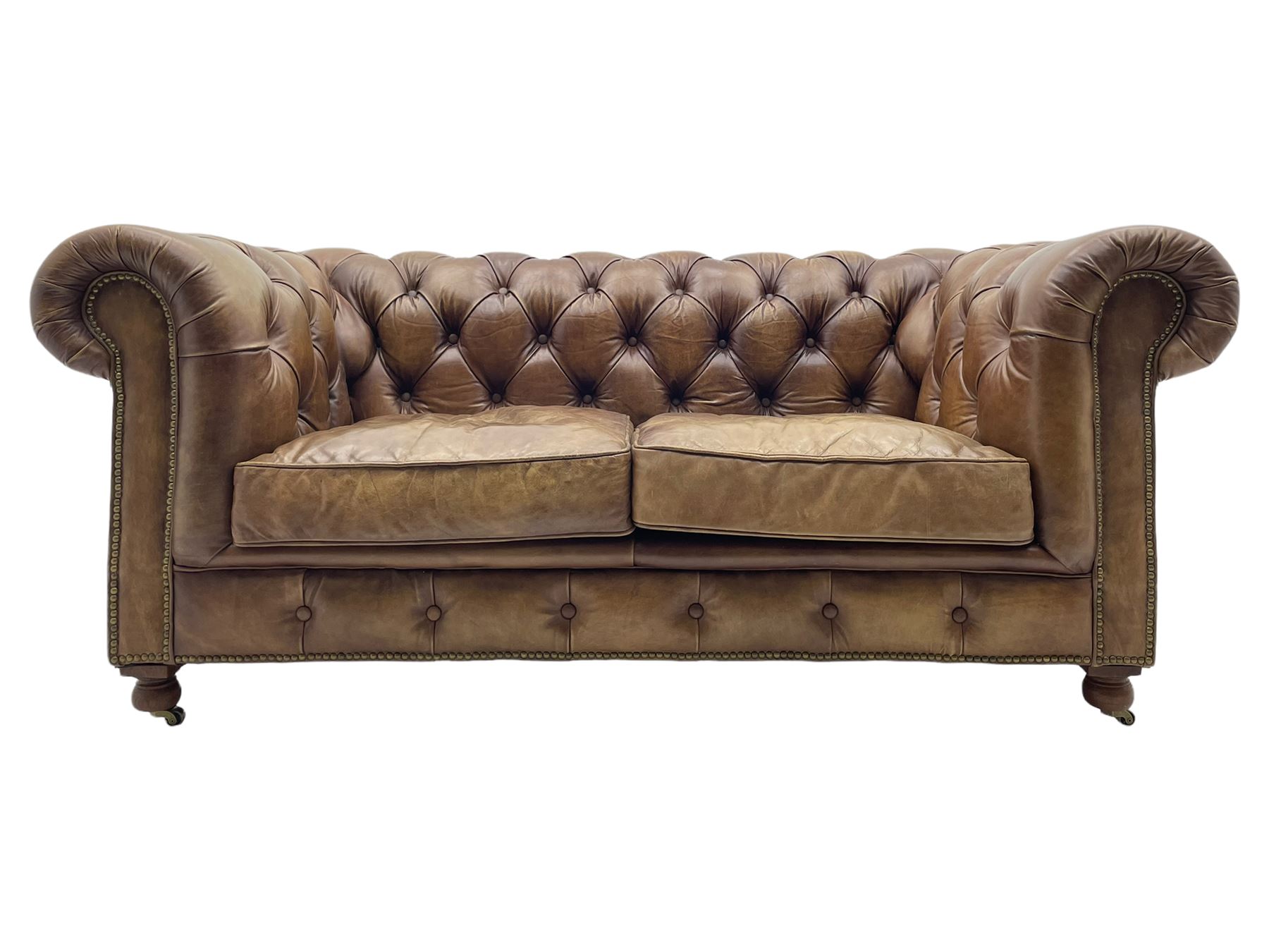 HALO - Chesterfield style two seat sofa upholstered in buttoned brown leather with stud work