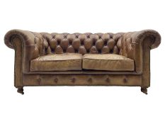 HALO - Chesterfield style two seat sofa upholstered in buttoned brown leather with stud work