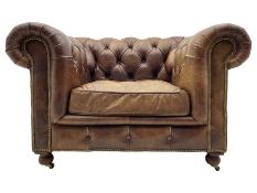 HALO - Chesterfield style armchair upholstered in buttoned brown leather with stud work