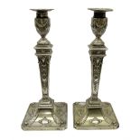 Pair of late Victorian silver plated Adam style candlesticks
