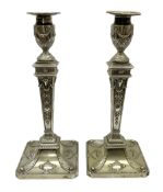 Pair of late Victorian silver plated Adam style candlesticks