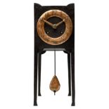 A German Arts and Crafts 'Gesamtkunstwerk' mantle clock c1890 in a square formed iron case with abal