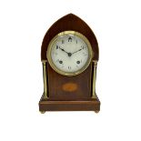 Early 20th century mahogany Lancet shaped mantle clock with an American �Ansonia� eight-day striking