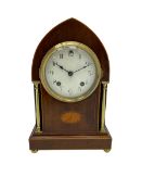 Early 20th century mahogany Lancet shaped mantle clock with an American �Ansonia� eight-day striking