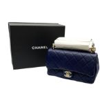 Chanel quilted flap bag of lambskin leather with light gold tone hardware