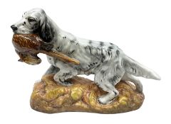 Royal Doulton model of an English setter carrying a pheasant