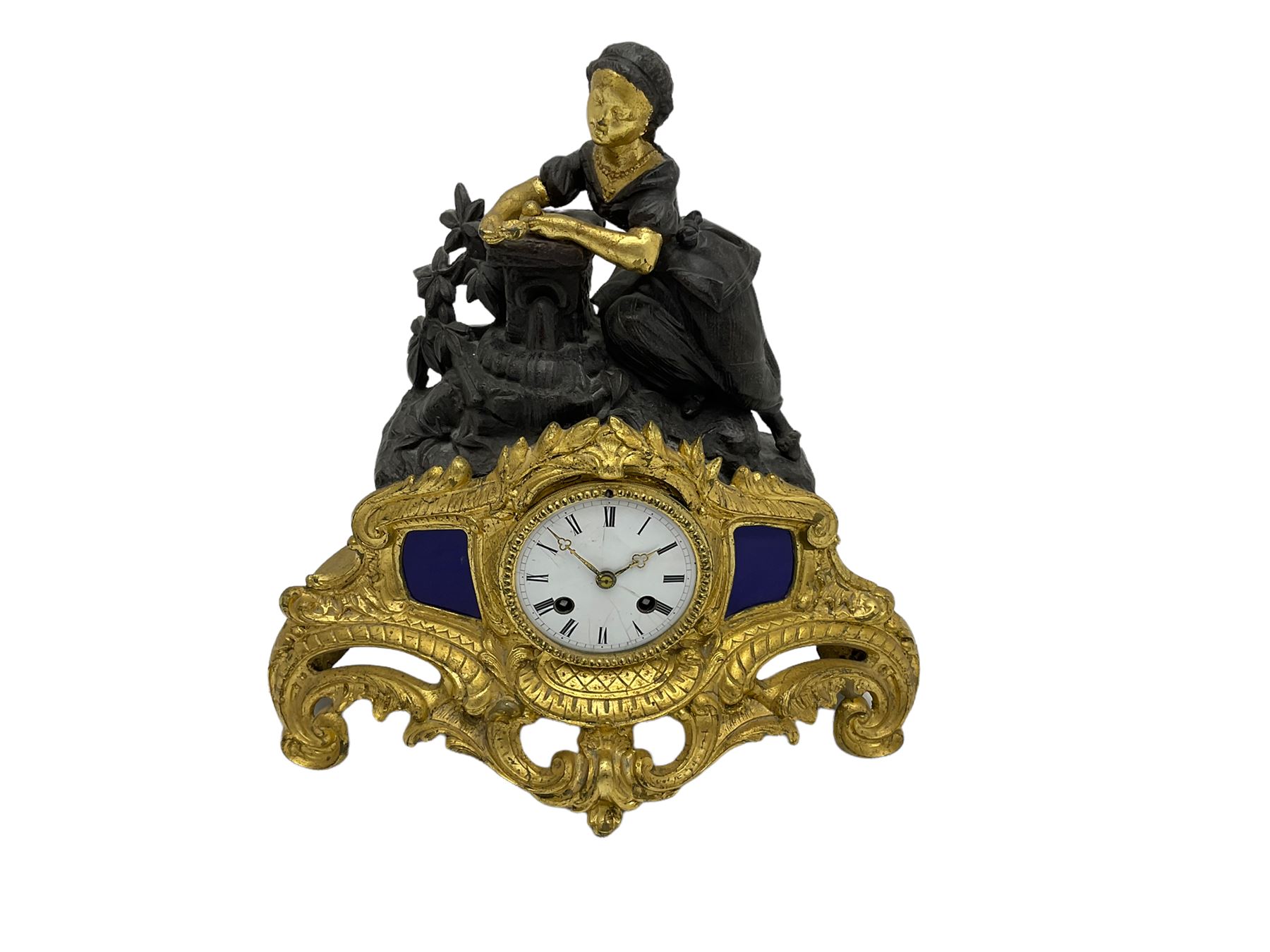 Early 19th century c 1820 French mantle clock in a spelter and gilt case