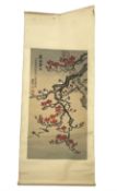 Japanese scroll painting depicting sparrows perched upon a blossoming branches