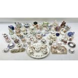 Collection of 19th century and later cabinet miniatures and small teapots and tea sets