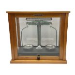 Griffin & George set of laboratory scales in fully glazed hardwood cabinet with rise-and-fall front