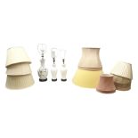 Three white ceramic table lamps