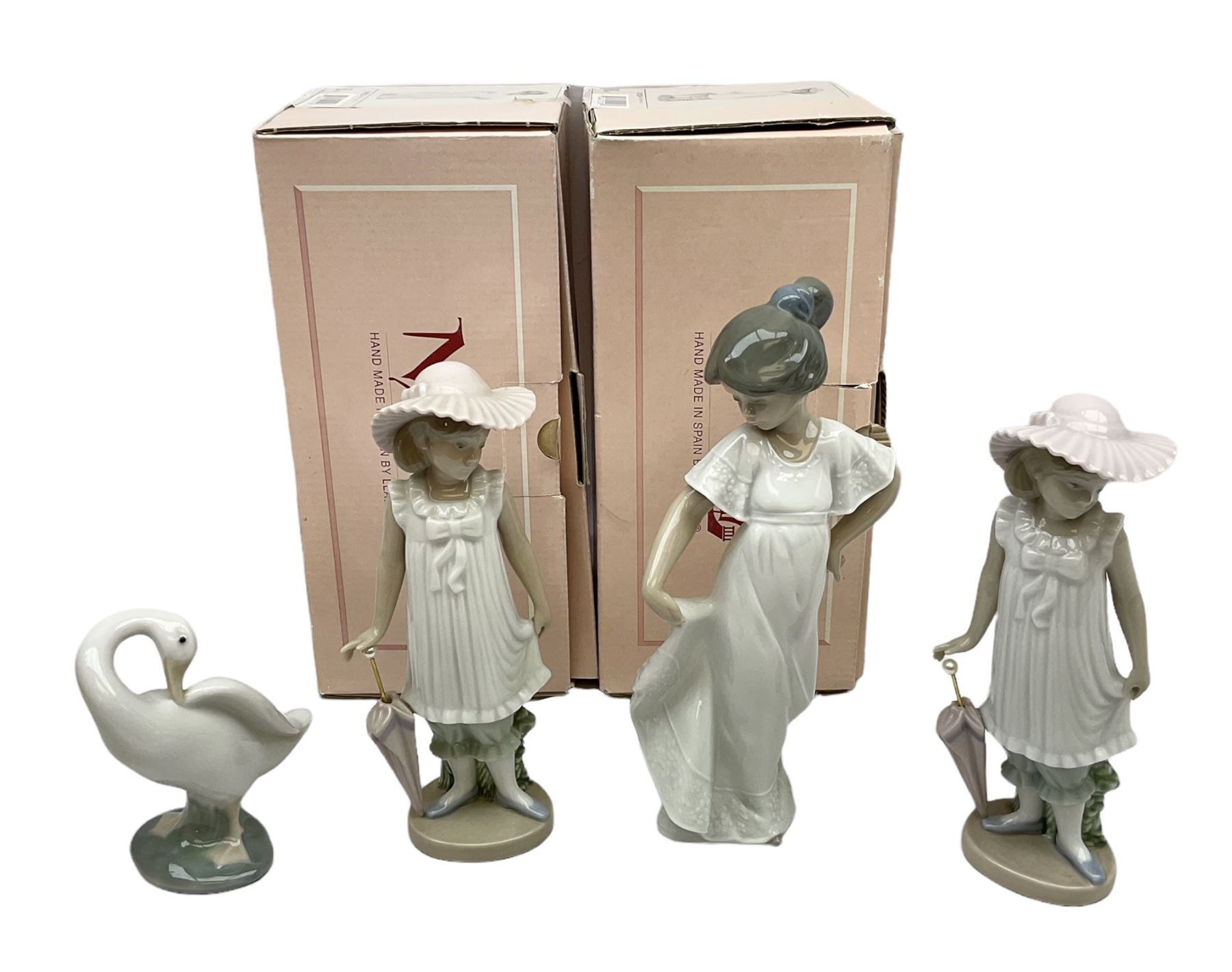 Quantity of figures to include Lladro example modelled as swan together with three Nao figures to in