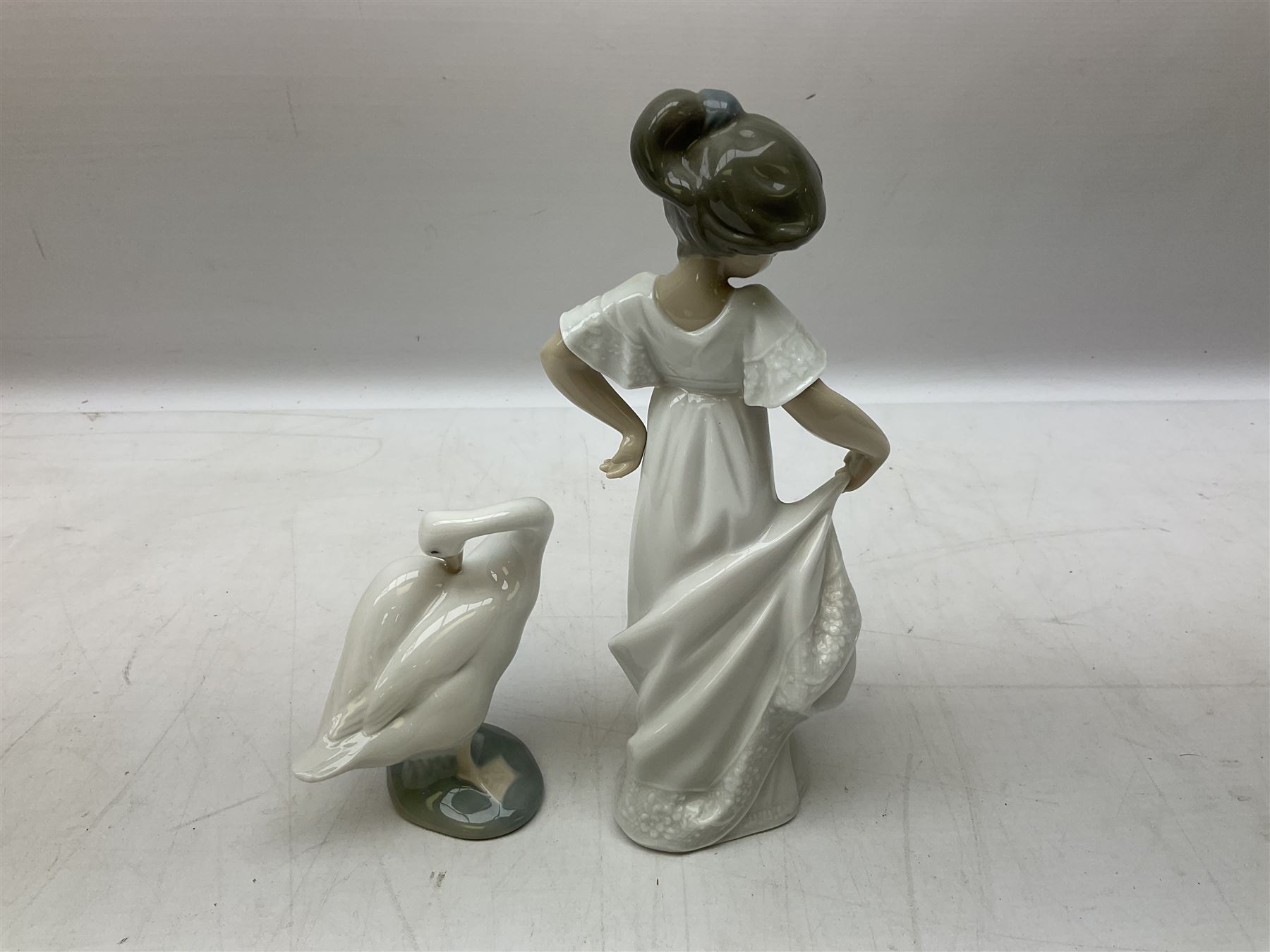 Quantity of figures to include Lladro example modelled as swan together with three Nao figures to in - Image 6 of 7