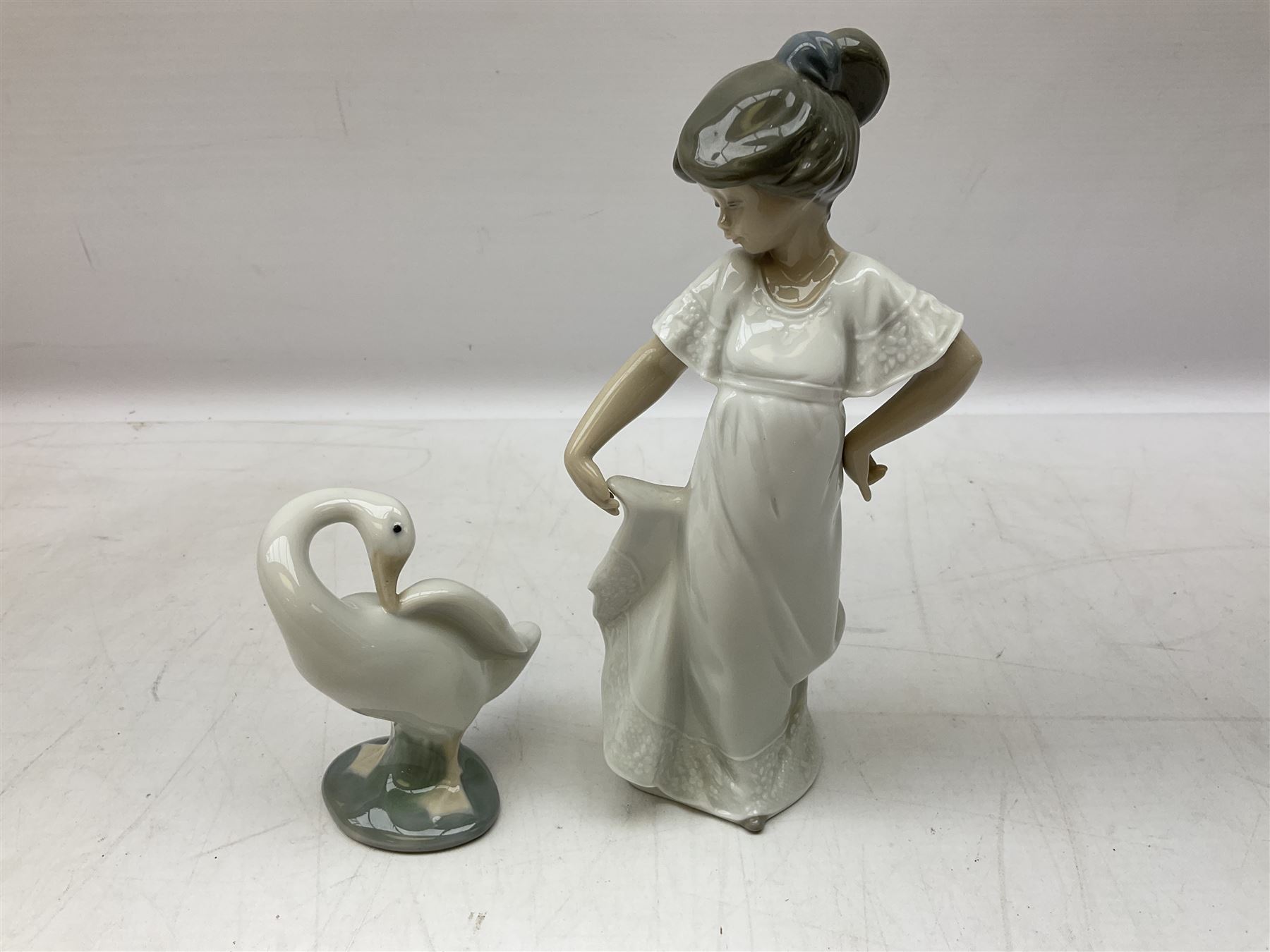 Quantity of figures to include Lladro example modelled as swan together with three Nao figures to in - Image 5 of 7