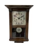 Early 20th century striking wall clock with a silvered sheet dial.