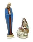 Hummel figure of a praying Saint together with a figure of a seated girl with deer