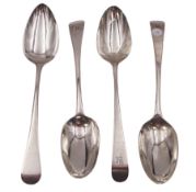Four George III silver Old English pattern table spoons