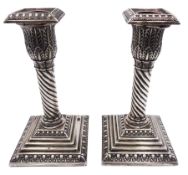 Pair of Edwardian silver candlesticks