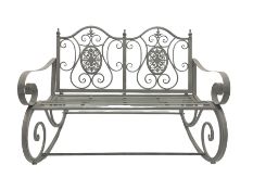 Wrought metal rocking garden bench seat