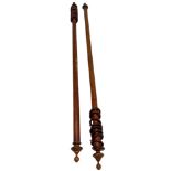 Two Victorian stained beech curtain poles