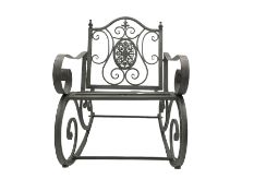 Wrought metal rocking garden armchair